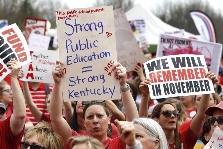 Kentucky Public school teachers rally for a "day of action" at the Kentucky State Capitol to try to pressure legislators to override Kentucky Governor Matt Bevin's recent veto of the state's tax and budget bills April 13, 2018 in Frankfort, Kentucky.